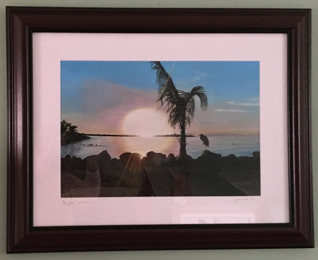 Art painting of a sunset on a beach with a palm tree framed